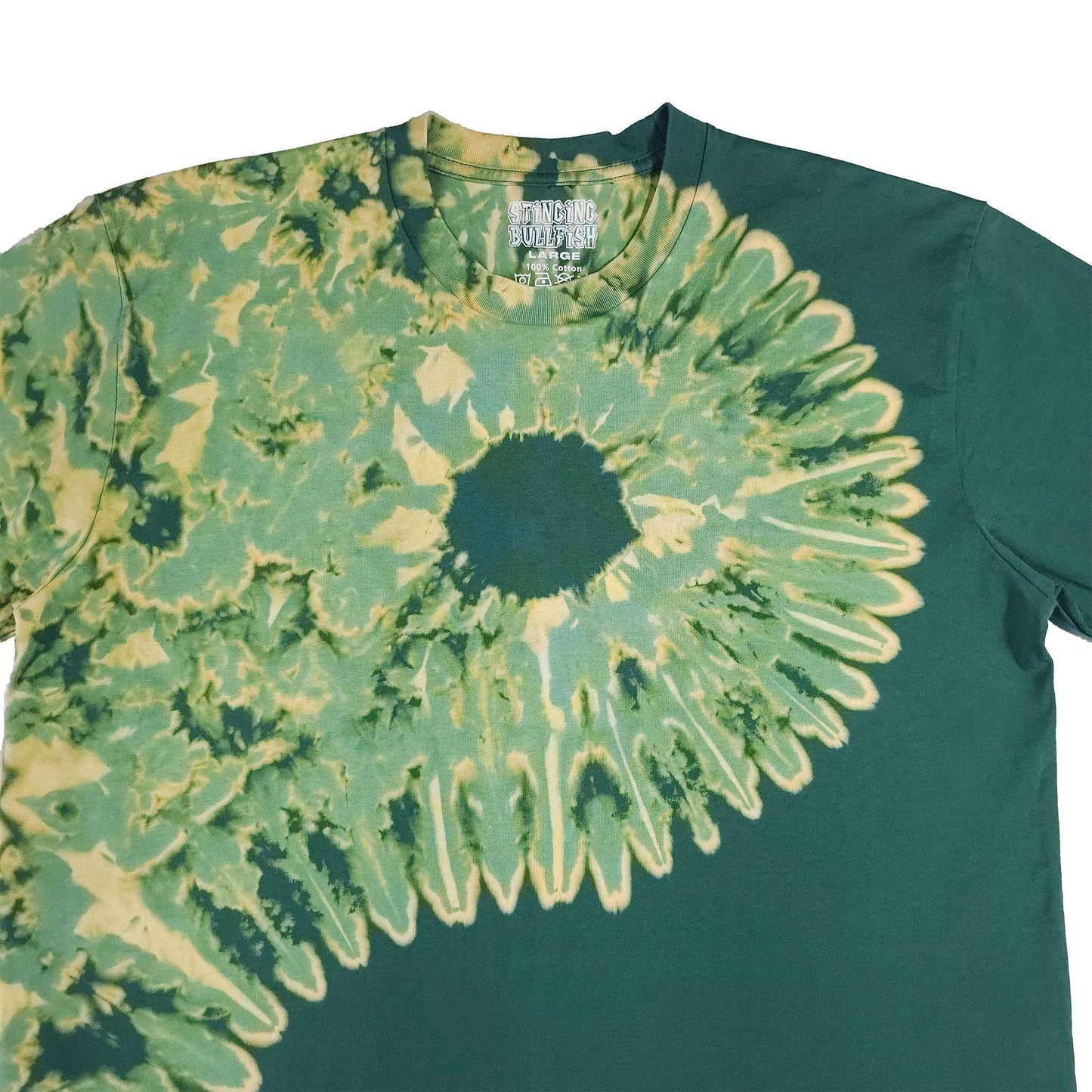 Forest green bleach-dye T-shirt close-up of yin-yang sunburst spiral graphic