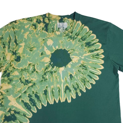 Forest green bleach-dye T-shirt close-up of yin-yang sunburst spiral graphic