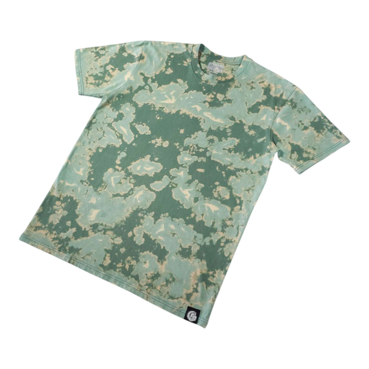 Green bleach-dye camo T-shirt at a side angle with short sleeves