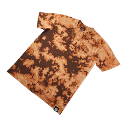 Folded tie-dye T-shirt in orange and dark brown, short sleeves and crew neck.
