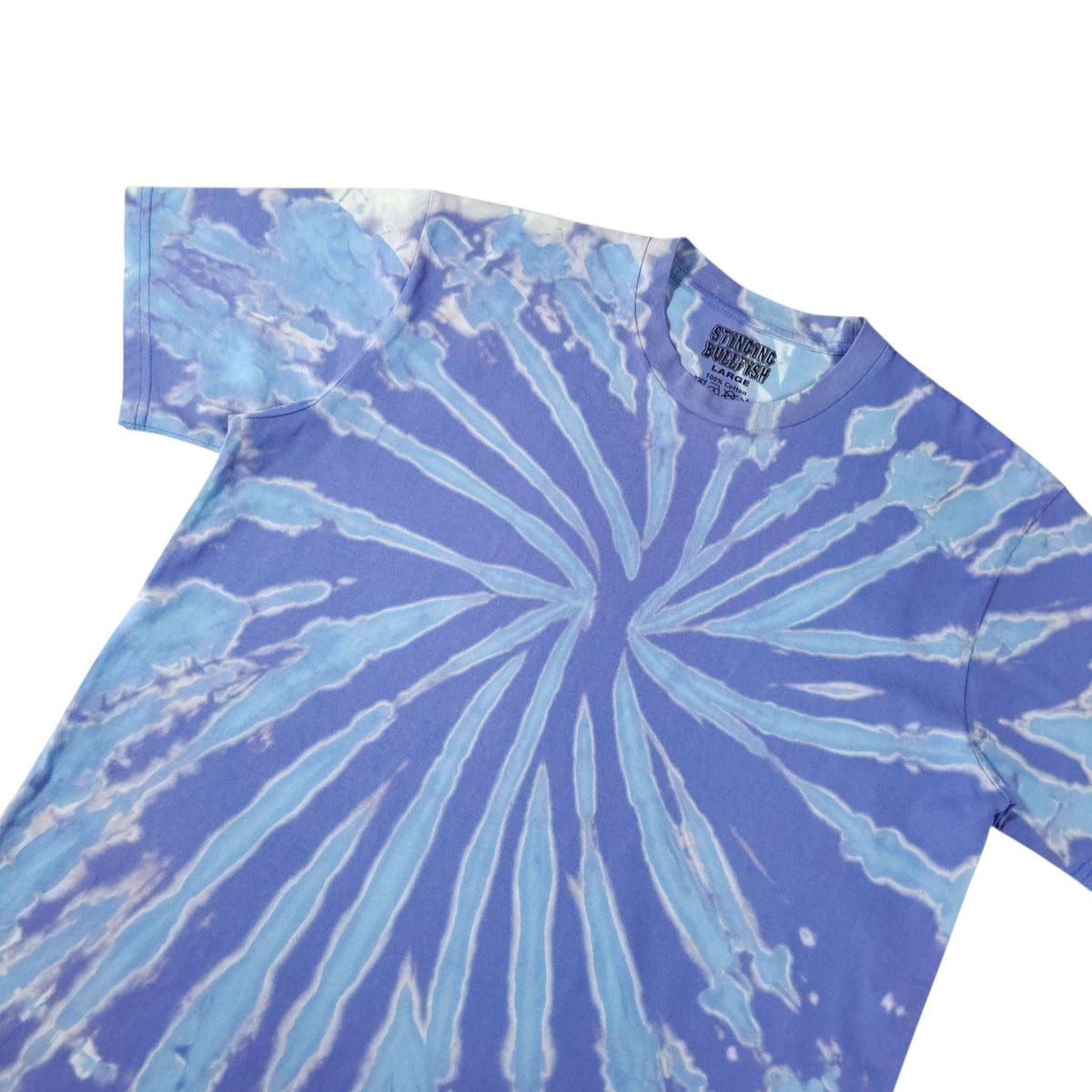 Blue tie-dye T-shirt close-up, spiral burst center with light streaks, crew neck