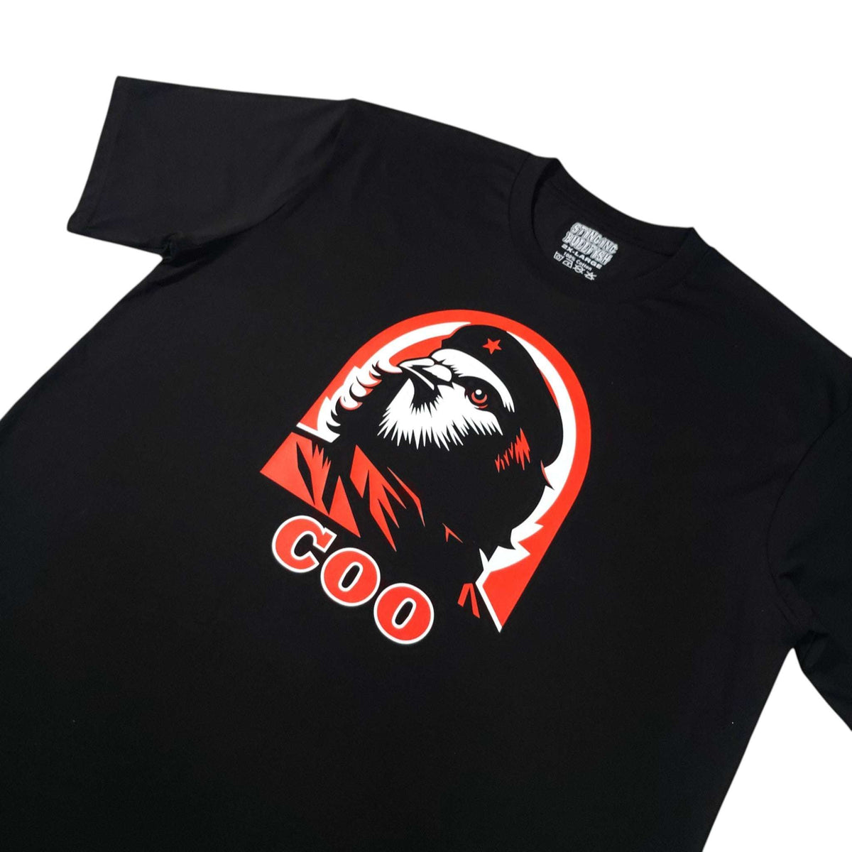 Black T-shirt with slanted pigeon emblem and red COO text detail.