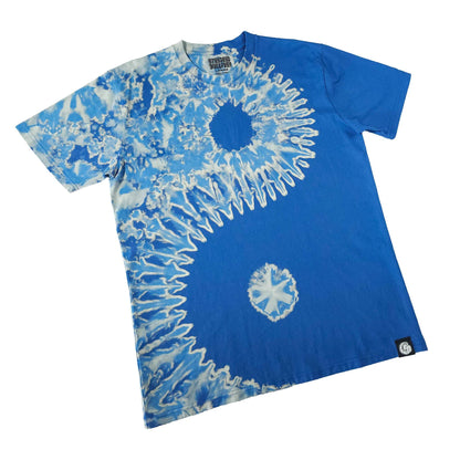 Blue bleach-dye graphic T-shirt with dark center circle and white burst medallion