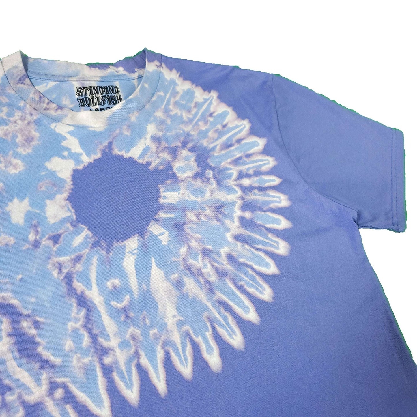 Blue bleach-dye T-shirt with white spiral burst graphic on chest, short sleeves.