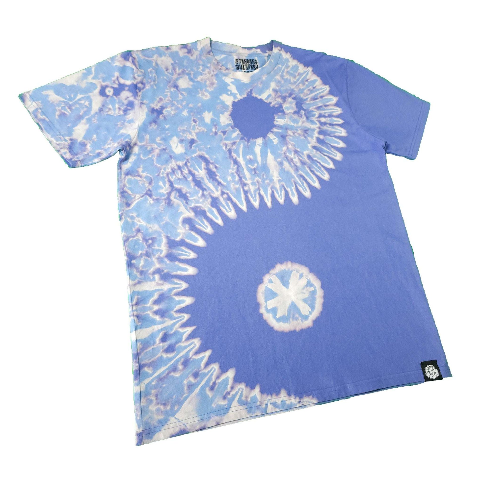 Blue bleach-dye T-shirt with two white spiral circles and short sleeves.