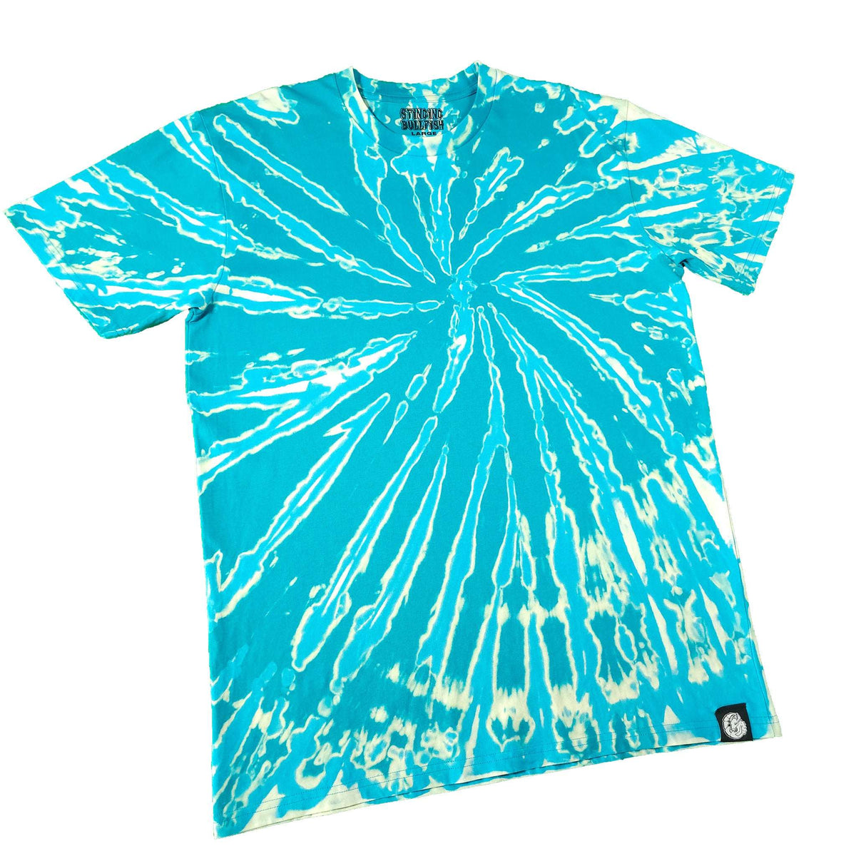 Teal tie-dye T-shirt with white spiral burst, crew neck, short sleeves, curved hem.