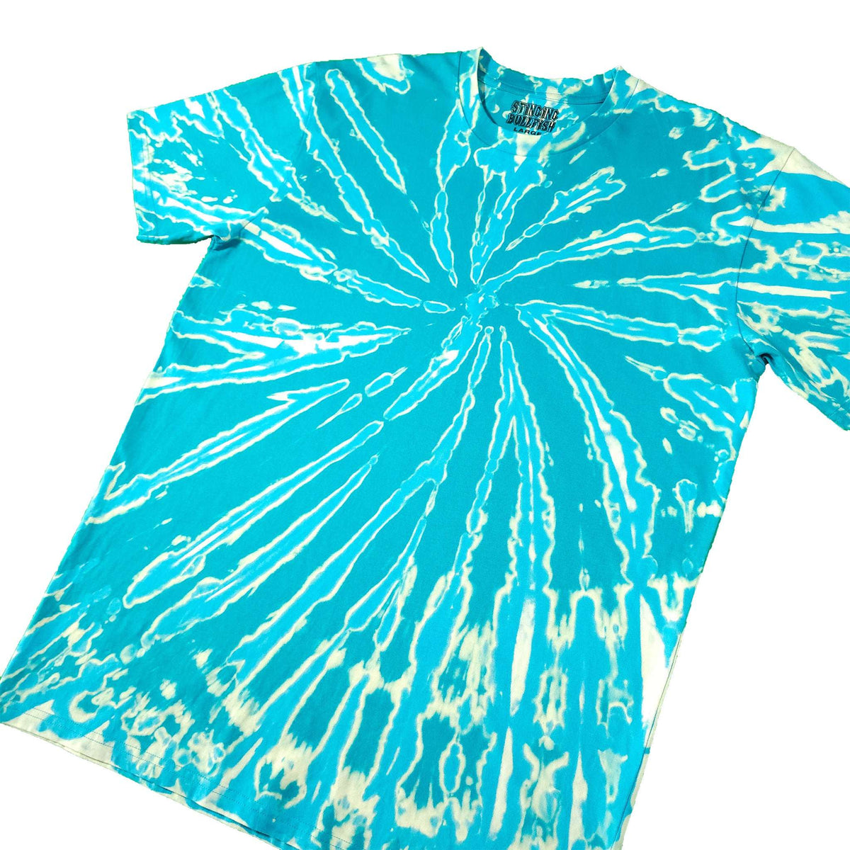 Teal tie-dye T-shirt with white sunburst spiral, crew neck and short sleeves.