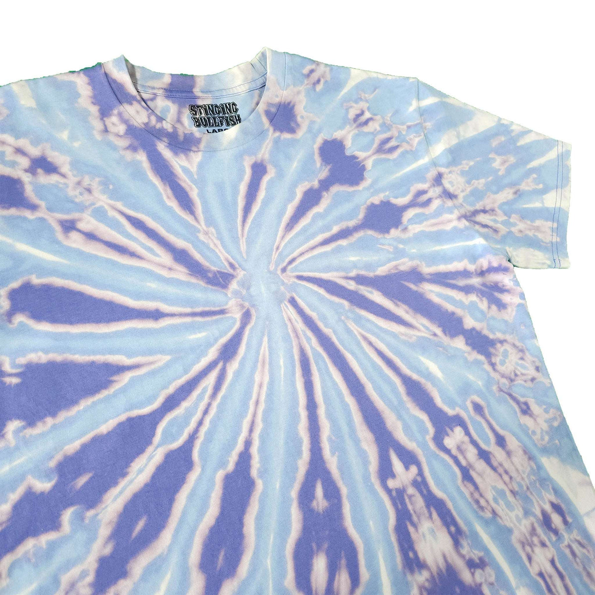 Blue and lavender spiral tie-dye T-shirt close-up, crew neck, short sleeve