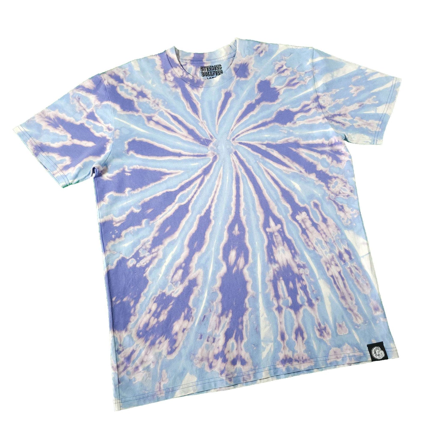 Blue and lavender spiral tie-dye T-shirt with small logo patch at hem