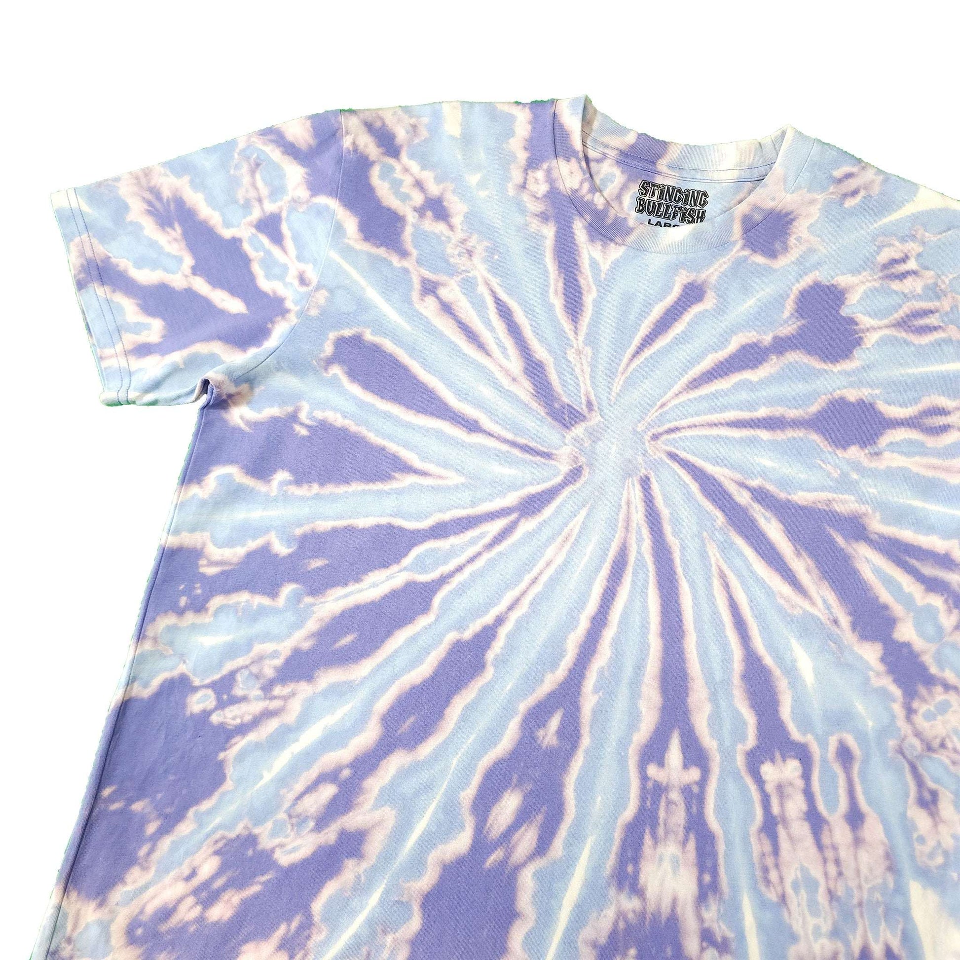 Blue and lavender spiral tie-dye T-shirt, angled view, crew neck and sleeve