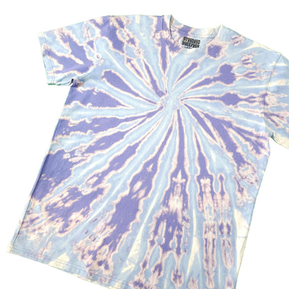 Blue and lavender spiral tie-dye T-shirt, tilted view, crew neck, short sleeves