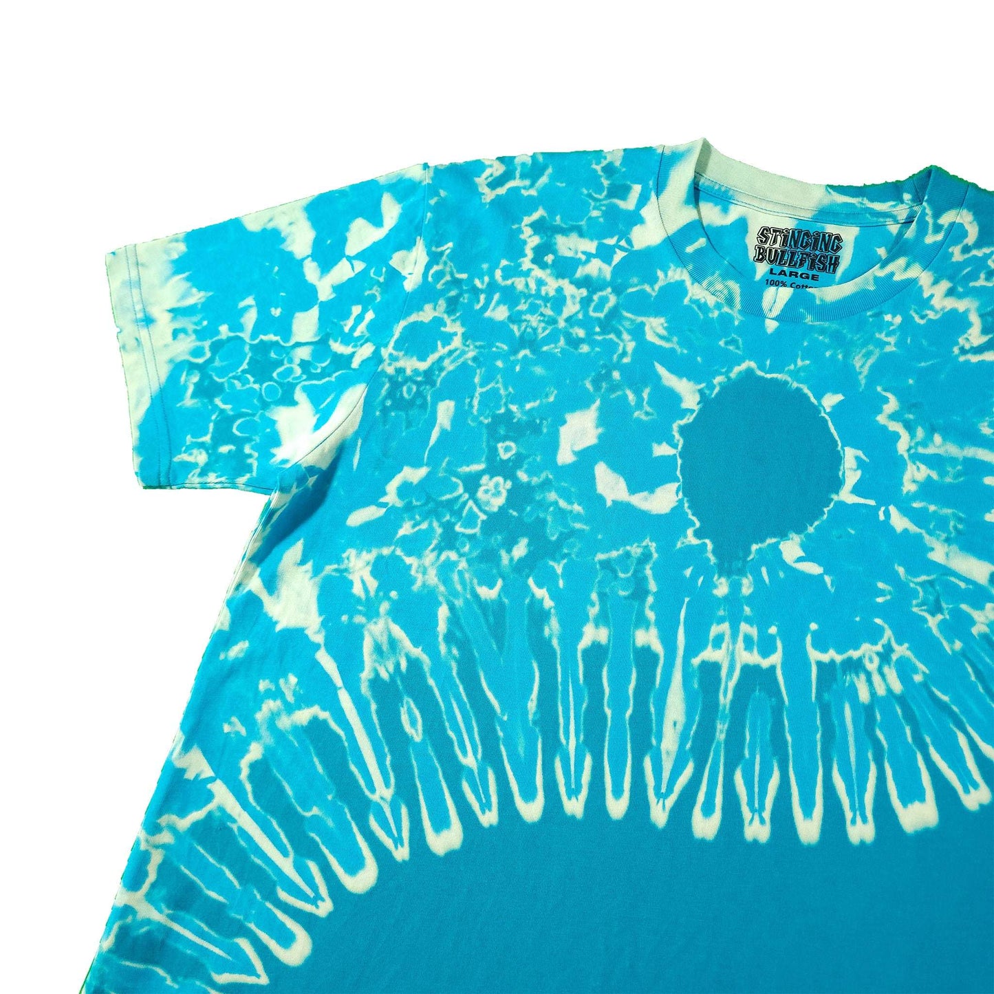 Teal tie-dye T-shirt with white sunburst pattern and circular emblem on chest