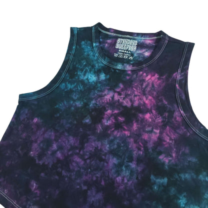 Sleeveless crop vest with purple and teal tie-dye pattern and neckline print