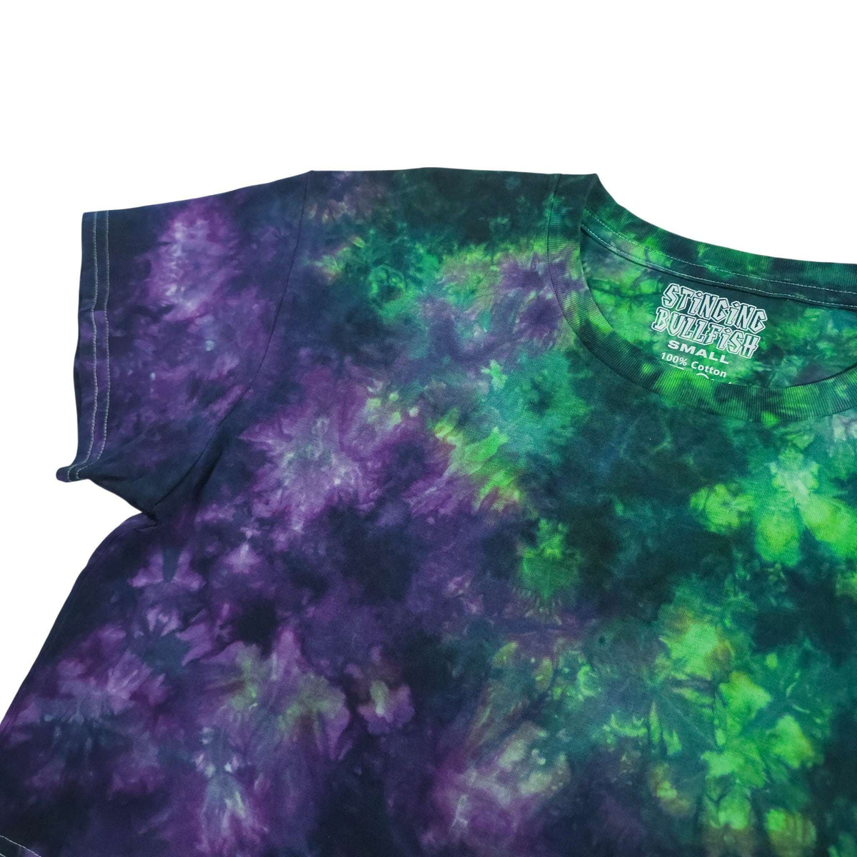 Tie-dye crop top with purple and green swirls, crew neckline, and small chest graphic