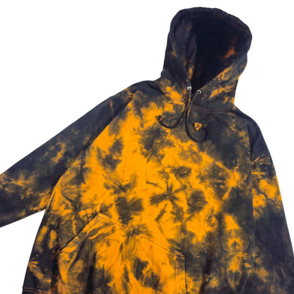 Front view of black and orange tie-dye zip-up hoodie with hood and drawstrings
