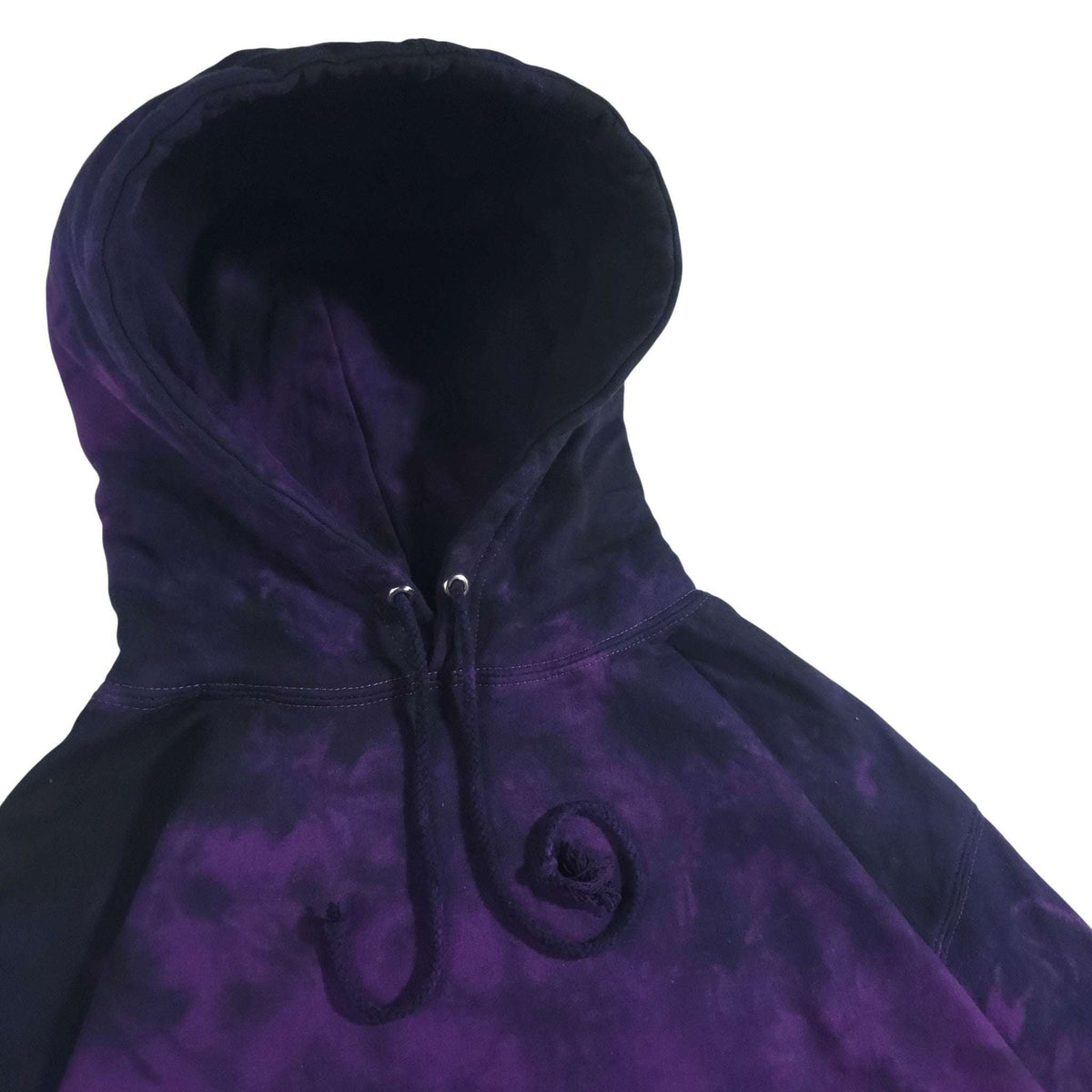 Deep purple-and-black tie-dye hoodie hood close-up with drawstrings and kangaroo pocket