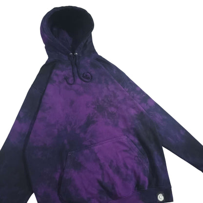 Deep purple-and-black tie-dye pullover hoodie with hood, pocket, and small chest logo