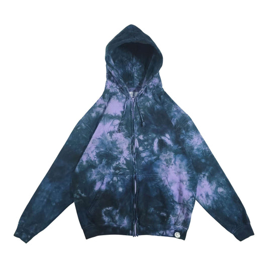Tie-dye zip-up hoodie with dark blue and purple patches, full sleeves, drawstring hood.