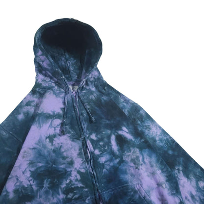 Tie-dye zip-up hoodie, hood up; dark blue with light purple and blue cloud-like swirls.