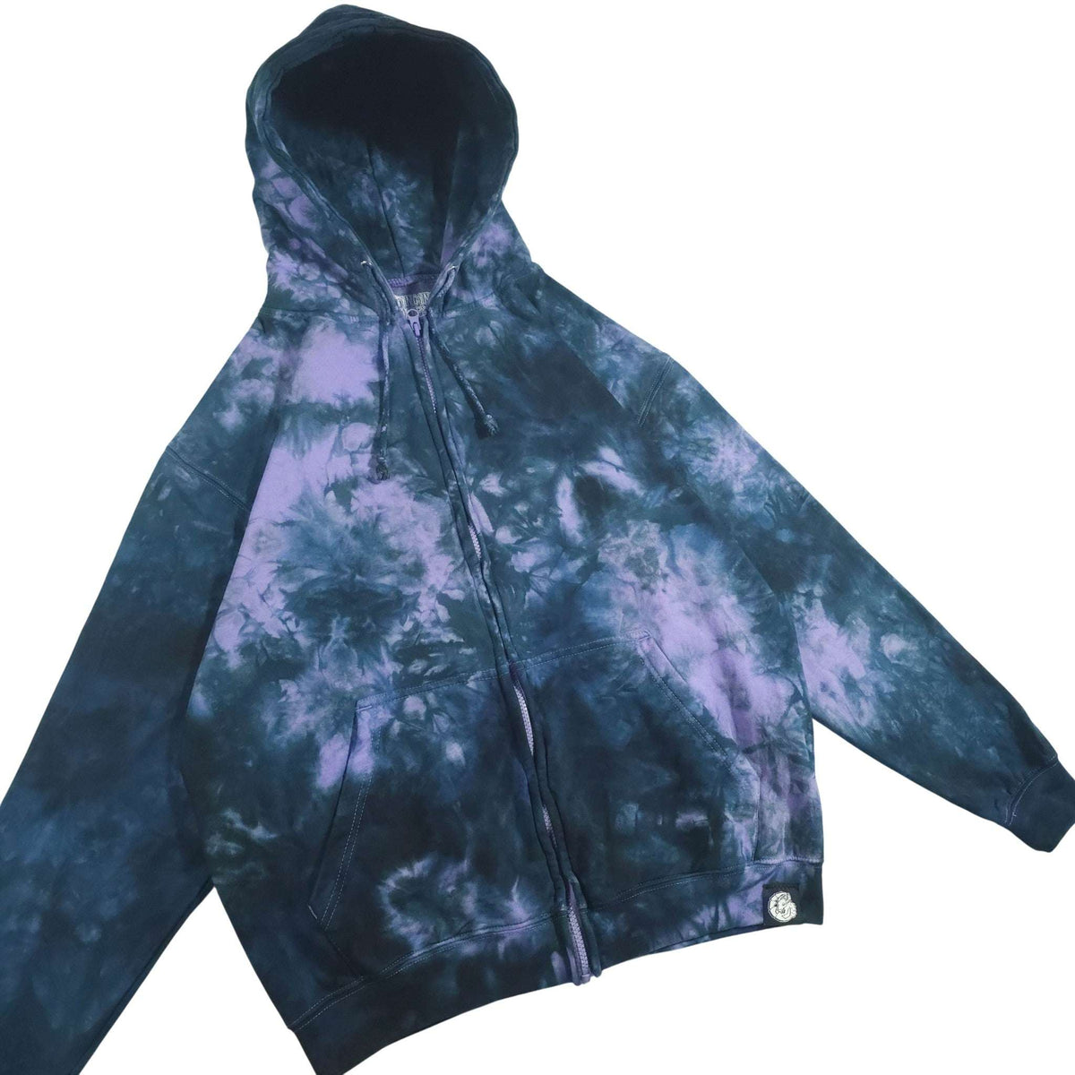 Tie-dye zip-up hoodie with hood up; dark blue sleeves and purple-lavender center print.