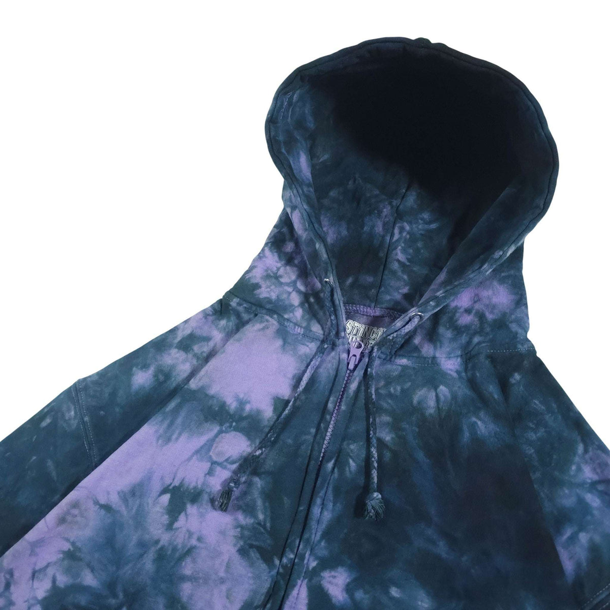 Tie-dye zip-up hoodie, 3/4 view; dark blue and lavender-purple swirl pattern with drawstrings.