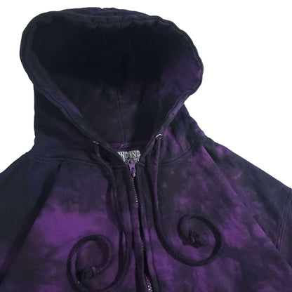 Purple and black tie-dye zip-up hoodie front with swirl graphics and zipper.