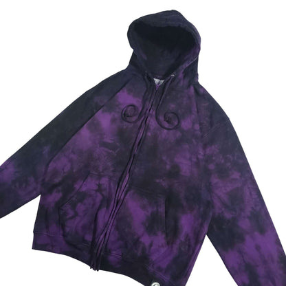 Purple and black tie-dye zip-up hoodie front three-quarter view with hood and zipper.