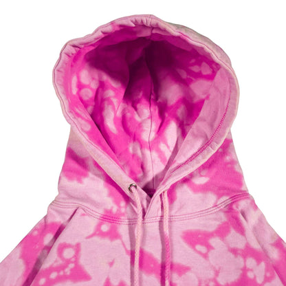Pink bleach-dyed camo hoodie close-up of hood interior and drawstring with metal tips