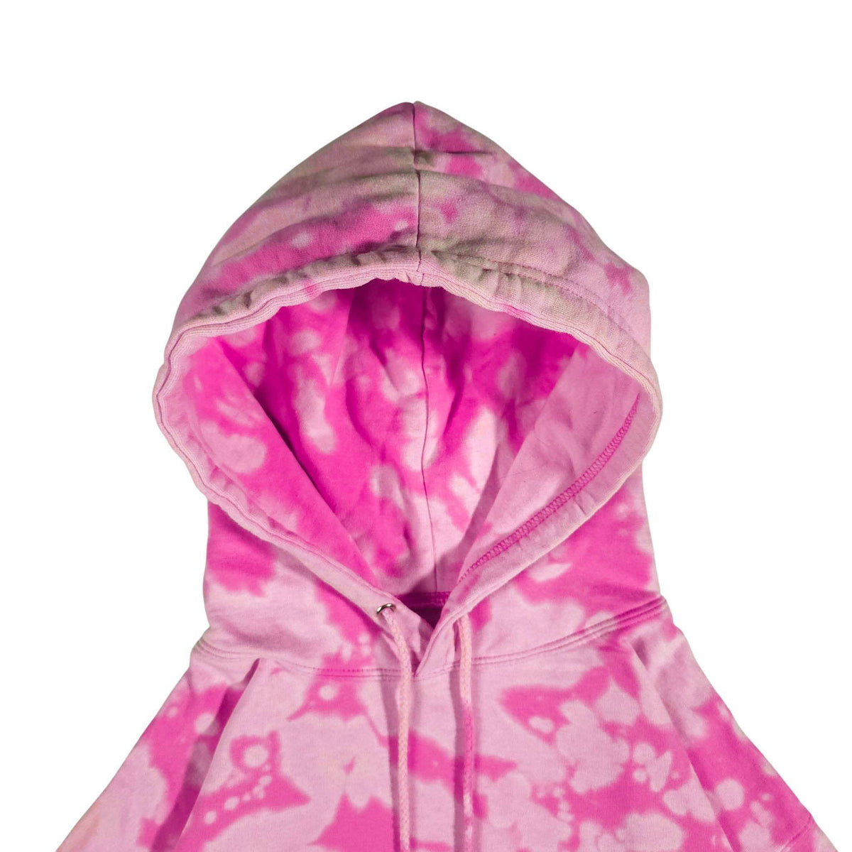 Pink bleach-dyed camo hoodie close-up of hood and drawstrings, front seam and stitching
