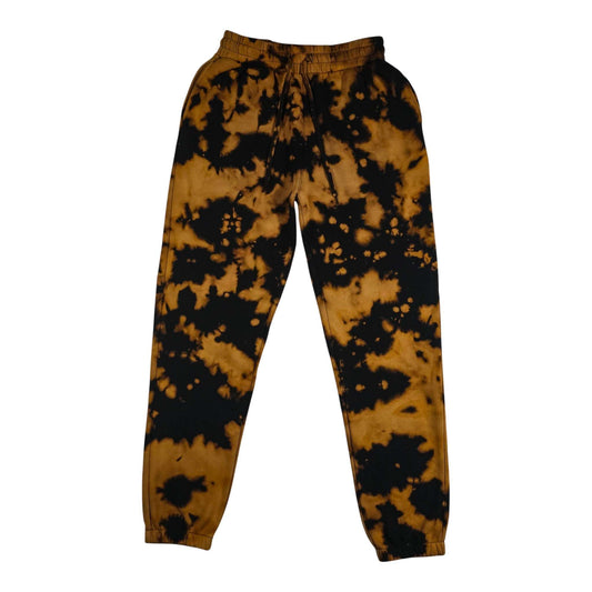 Tie-dye jogging bottoms with elastic waist, drawstring, cuffed hem; black and tan splatter.