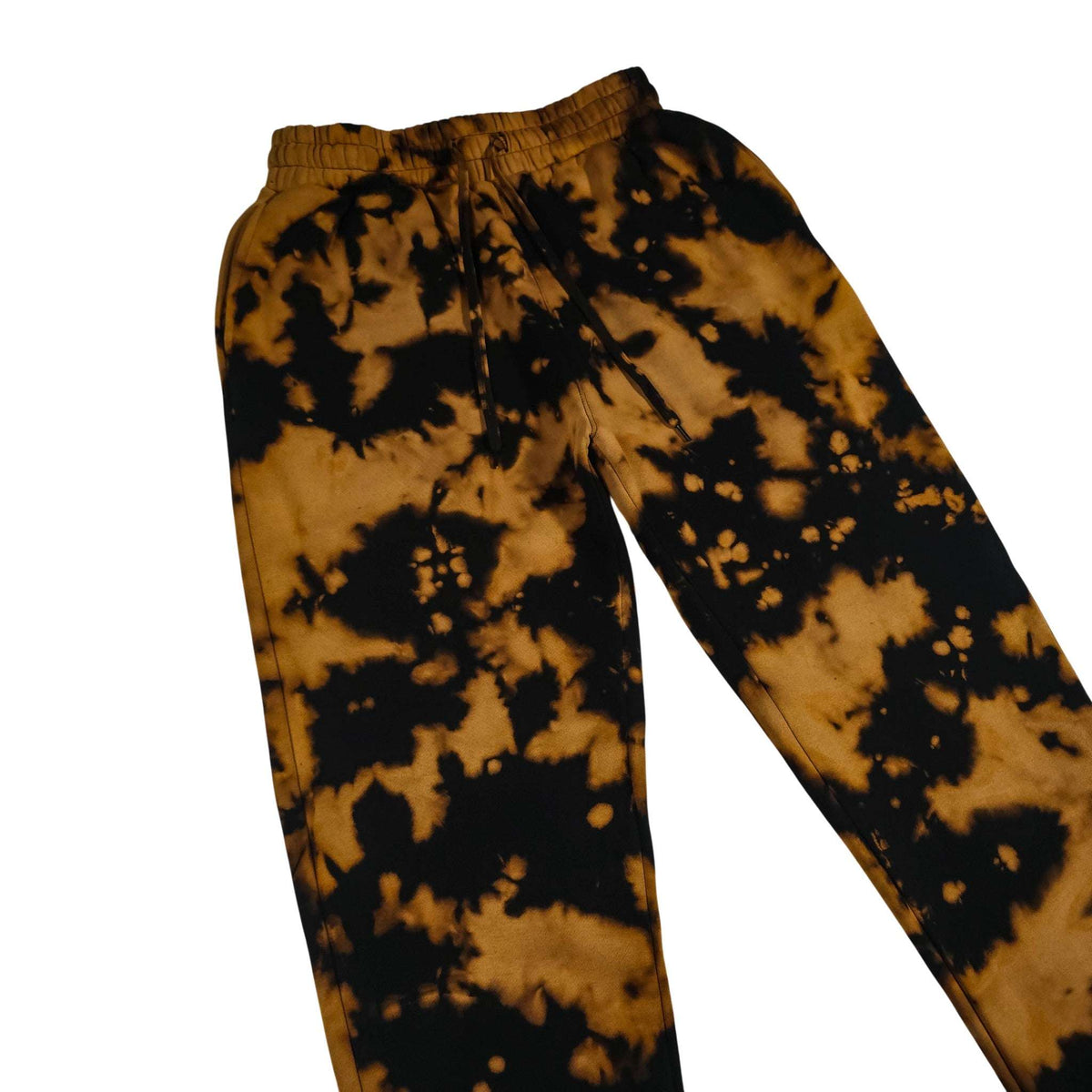 Tie-dye jogging bottoms with elastic waist and drawstring; black-and-tan cloud print.