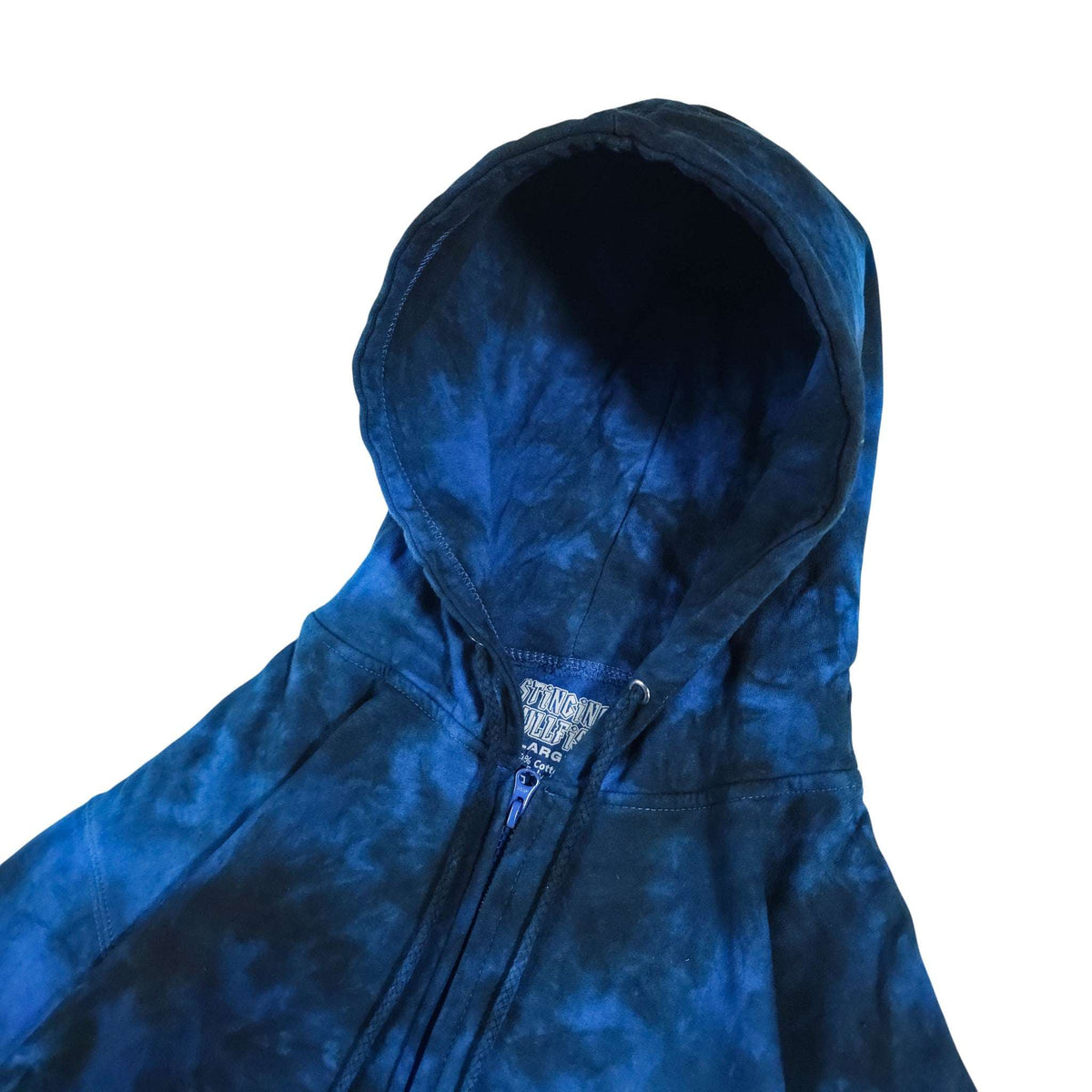 Blue tie-dye zip-up hoodie close view of hood lining, zipper, and drawstrings