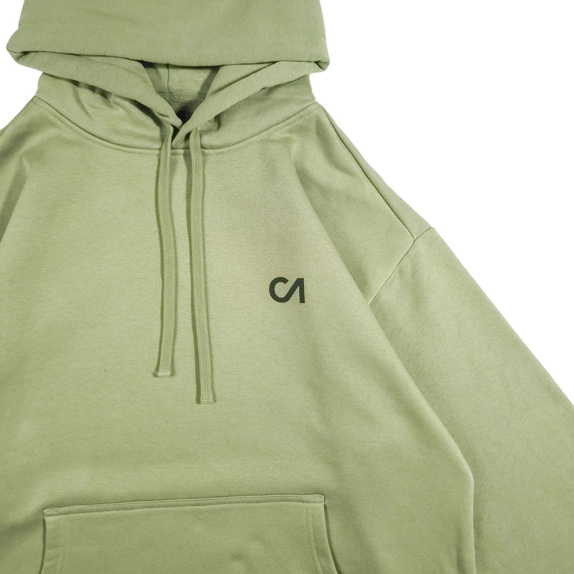 Light green hoodie with drawstring hood, CA logo on chest, and kangaroo pocket