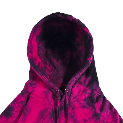Tie-dye pullover hoodie with dark hood interior and front drawstring; hot pink and black swirls