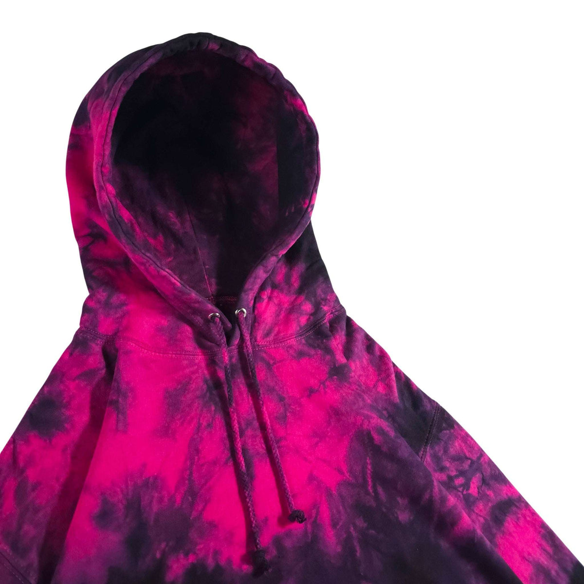 Tie-dye pullover hoodie with hood and drawcord, hot pink accents over dark base