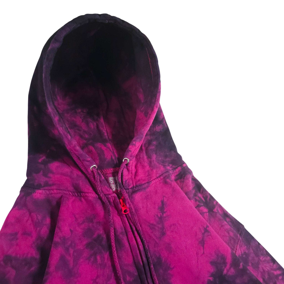 Tie-dye zip-up hoodie with hood and drawstring cords, front detail view