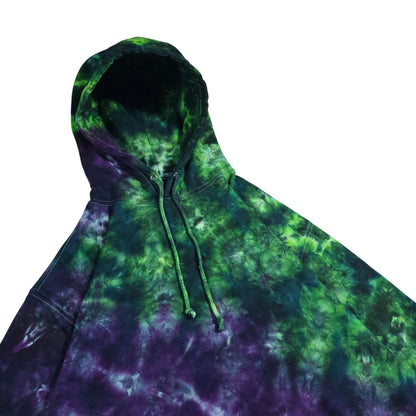 Tie-dye pullover hoodie with green and purple swirls and drawstring hood