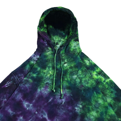 Green and purple tie-dye pullover hoodie with drawstring hood and front pocket seam