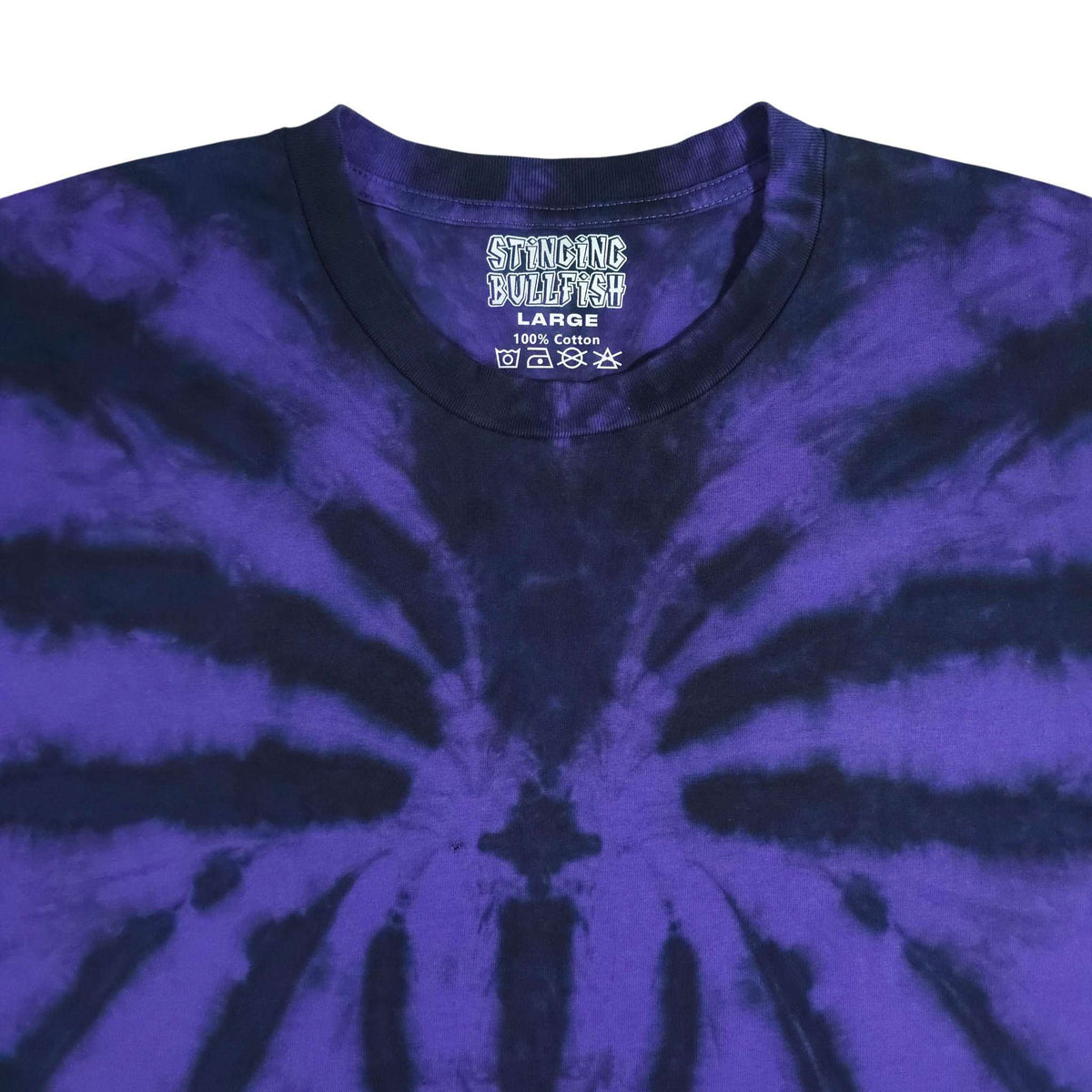 Purple and dark blue tie-dye T-shirt with 'Stinging Bullfish' neck graphic.