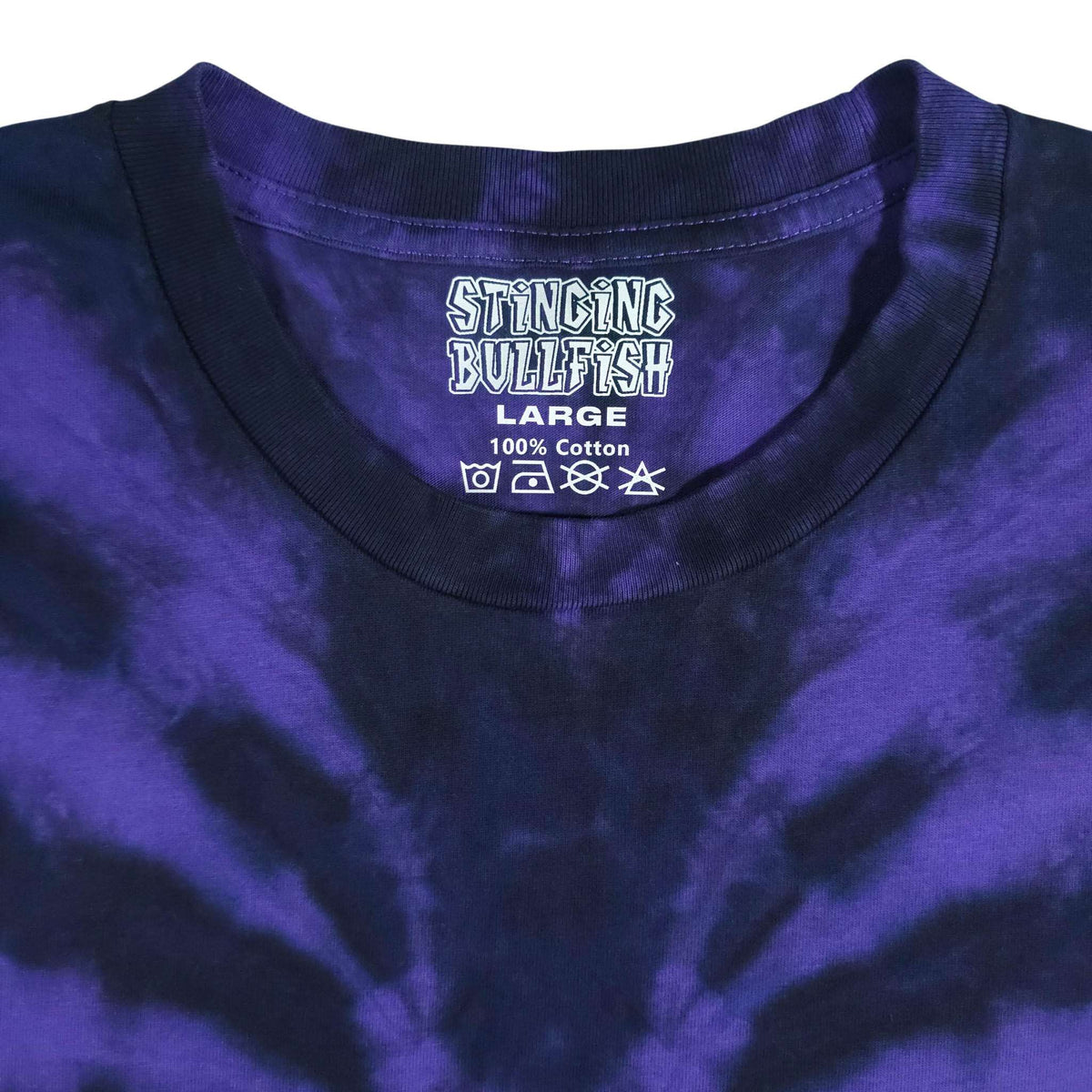 Purple and dark blue tie-dye T-shirt showing crew neck graphic and size text.