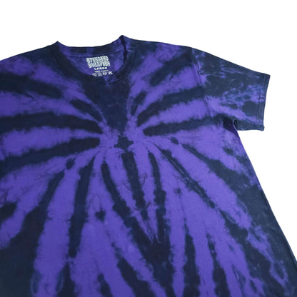 Purple and dark blue spiral tie-dye T-shirt close-up with crew neck label.