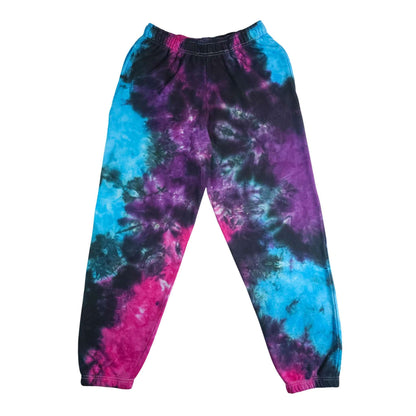 Tie-dye jogging bottoms with elastic waistband, tapered legs in blue/purple/pink swirl