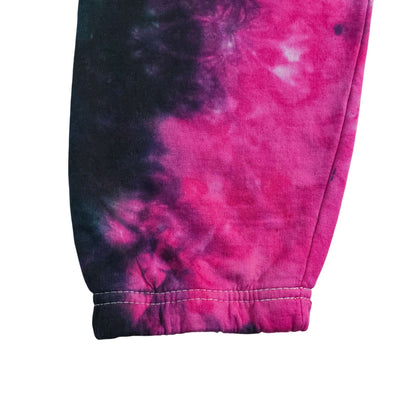 Tie-dye jogger cuff and ankle hem with elastic seam; dark, purple and pink swirl