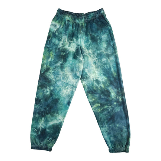 Teal and green tie-dye joggers with elastic waist and ribbed ankle cuffs.