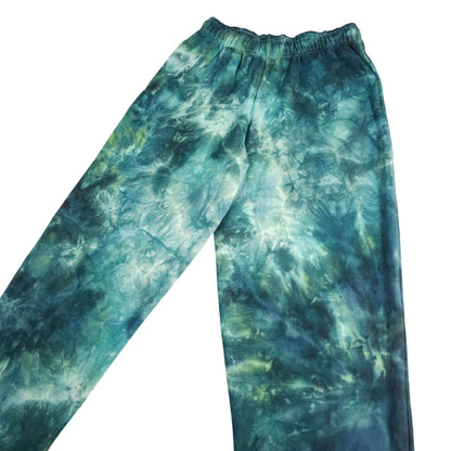 Tie-dye jogging pants, teal and green allover pattern, elastic waist and tapered legs.