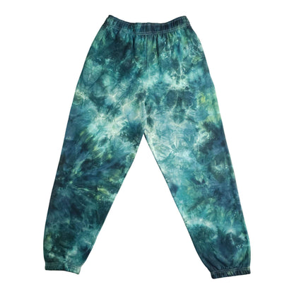 Teal and green tie-dye joggers with elastic waistband and ribbed ankle cuffs.