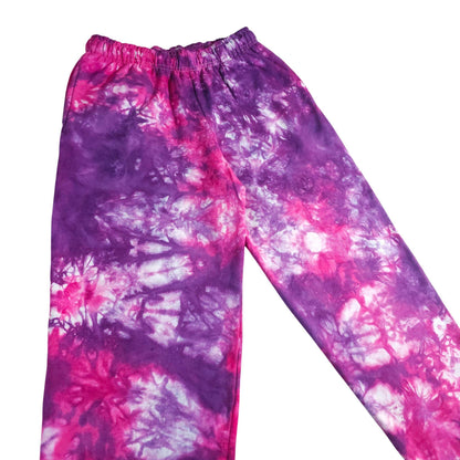 Purple and pink tie-dye track pants with elastic waistband
