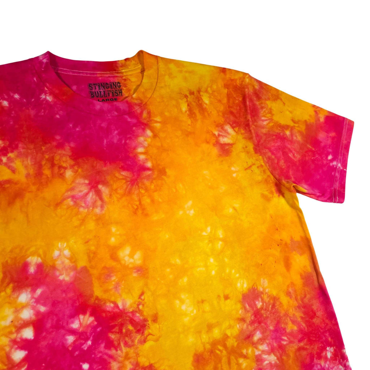Tie-dye T-shirt with orange and magenta swirl pattern, short sleeves, crew neck.