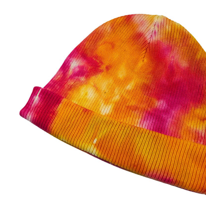 Multicolor tie-dye knit beanie hat with folded cuff in magenta