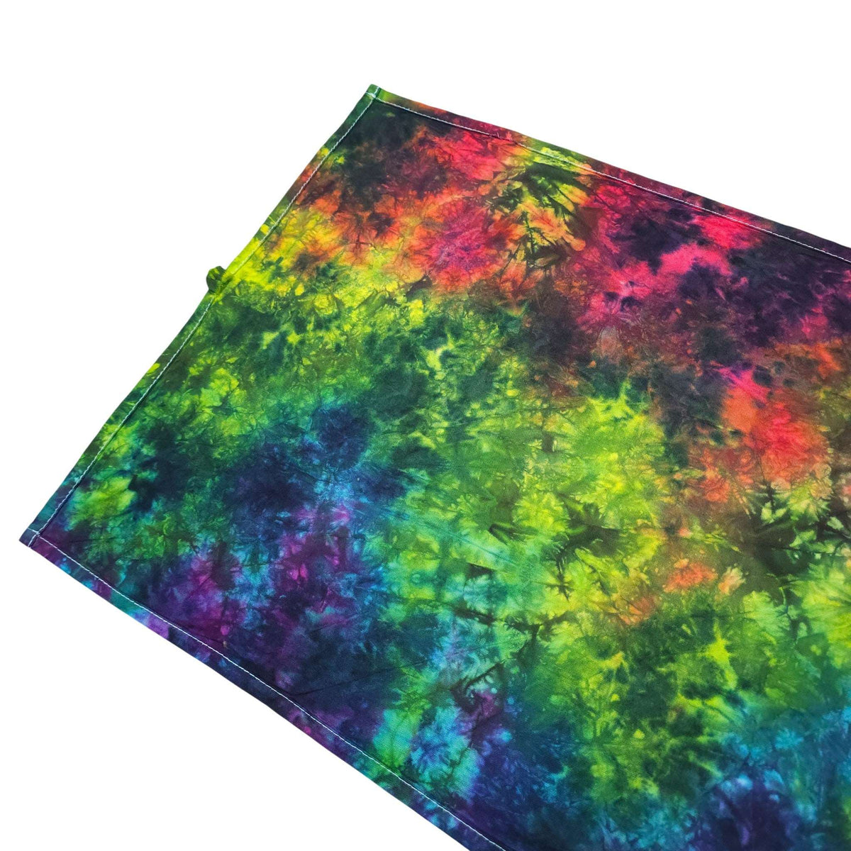 Tri-fold rainbow tie-dye tea towel, vibrant yellow-green, red, and deep blue